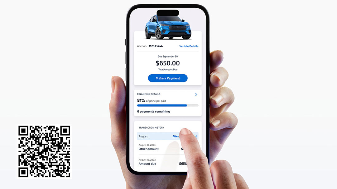 A person’s hands using a smartphone to access the Ford Credit Mobile App.
